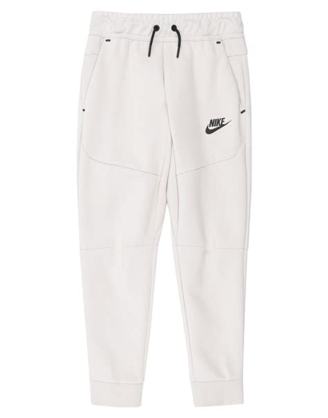 nike techno zwart|beige nike tech pants.